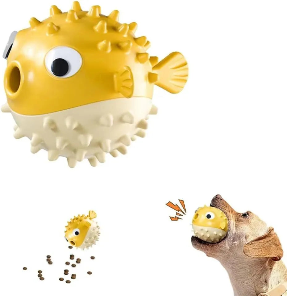 Green fish-shaped interactive dog toy with treat dispensing feature and internal bell for medium large dogs