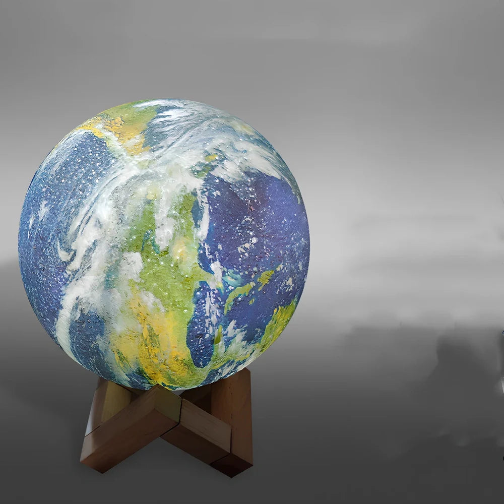 3D printed Earth lamp showing mountain topography with LED illumination through PVC material