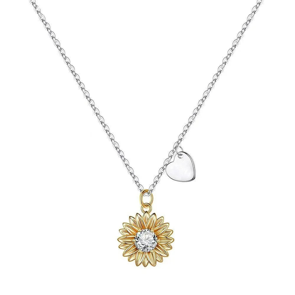 925 silver sunflower necklace with adjustable chain showing geometric daisy pendant design and cross chain detail