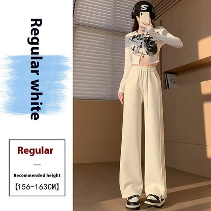 Comfortable cotton joggers in various colors and sizes, featuring a high-waist, straight-leg design for a relaxed, stylish look.