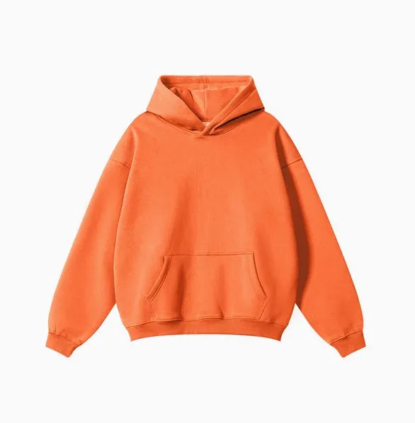 Men's grey terry hooded sweater with drop-shoulder sleeves and front pocket, showing textured cotton fabric