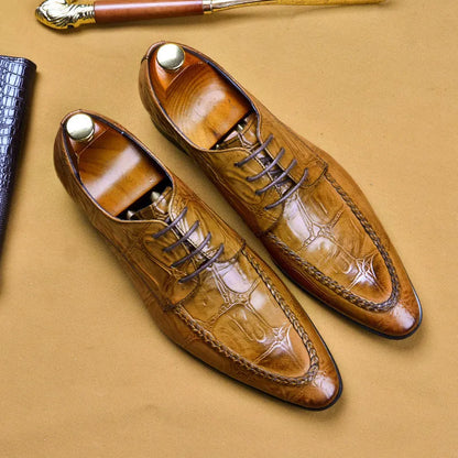 Men's black alligator pattern leather shoes with a horse bit buckle and rubber sole.