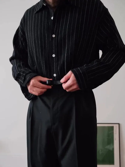 Men's black and white pinstripe long sleeve button down shirt with a regular fit.