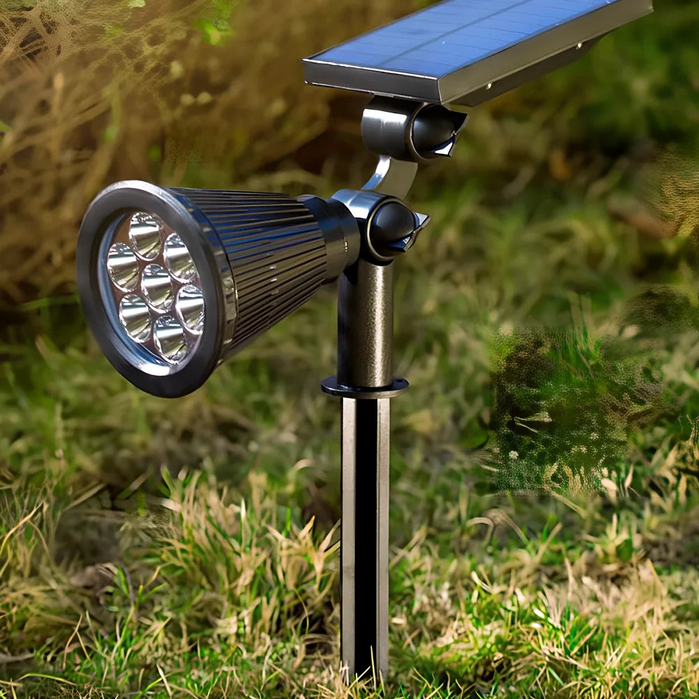 Solar lawn light with ground stake mounting, LED illumination, and waterproof housing for garden installation