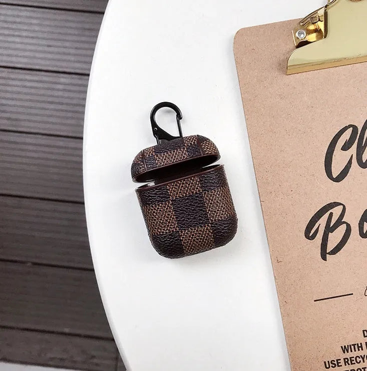 iPhone XS Max protective case with lattice pattern, headset storage slot, and a silver anti-lost hook.