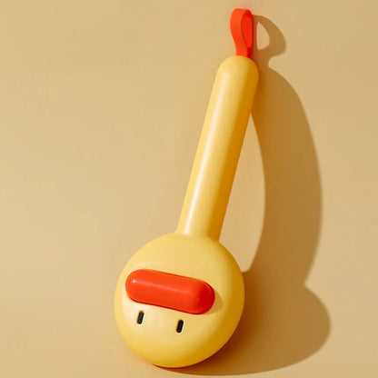 Small yellow duck-shaped pet grooming comb with needle pins and open section design