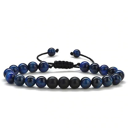 Tiger Eye and black agate geometric couple bracelets laid out as a matching set.