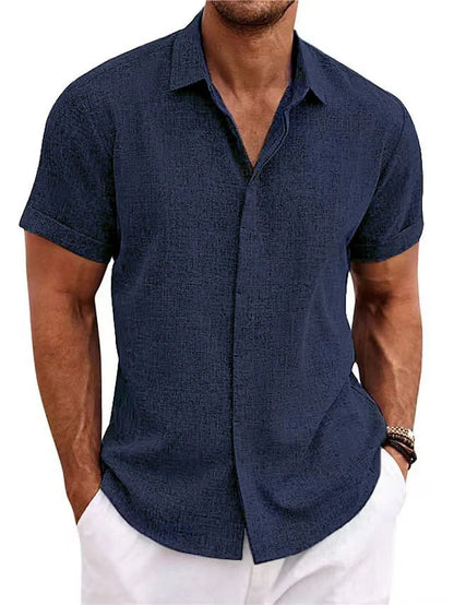 A versatile linen shirt in various colors, featuring a standing collar and short sleeves for a modern, tailored look.
