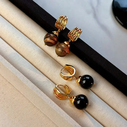 Gold-plated Tigereye earrings with geometric round shape in French retro style