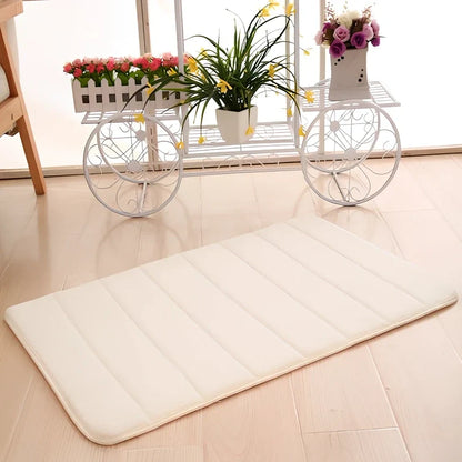 Memory foam bathroom carpet with coral fleece surface and non-slip latex backing in beige colour