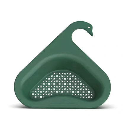 Yellow swan-shaped plastic kitchen drainer basket with drainage holes on kitchen counter