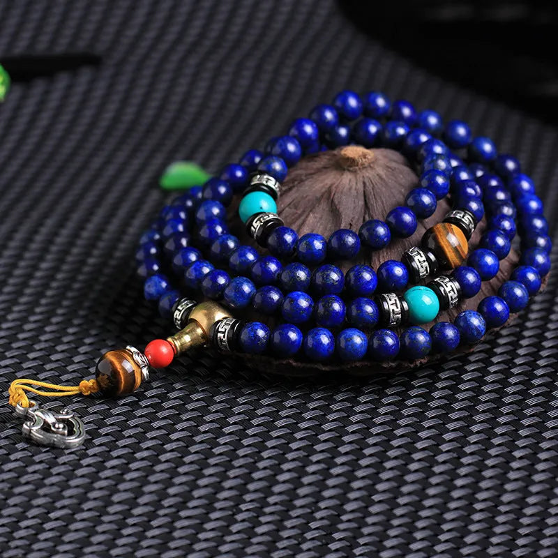 Natural lapis lazuli 108 bead bracelet with zodiac animal modelling in blue stone with gold flecks