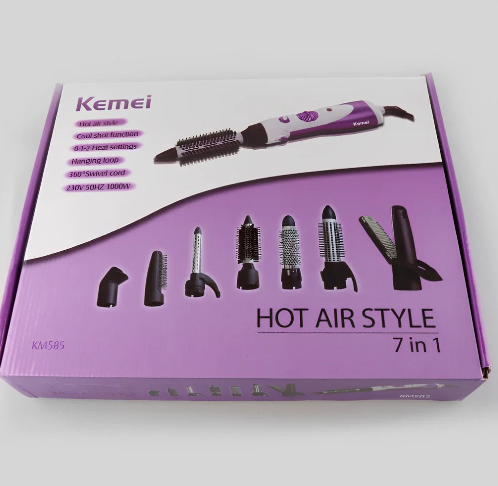 Purple folding hair dryer with diffuser attachment showing compact 20.5cm size