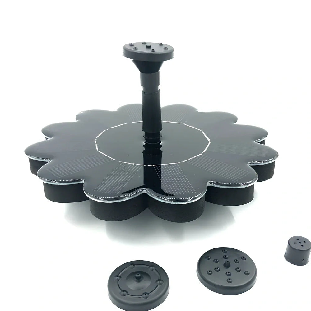 Black solar garden sprinkler with 160mm diameter panel showing adjustable 35-65cm spray height for plant watering