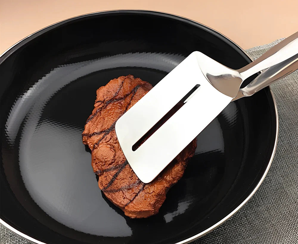 Stainless steel barbecue tongs with 32cm handles and serrated gripping surfaces