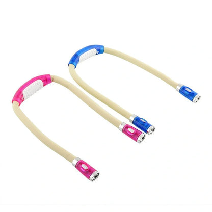 Flexible neck book light with U-shaped design showing adjustable LED reading lamp in use