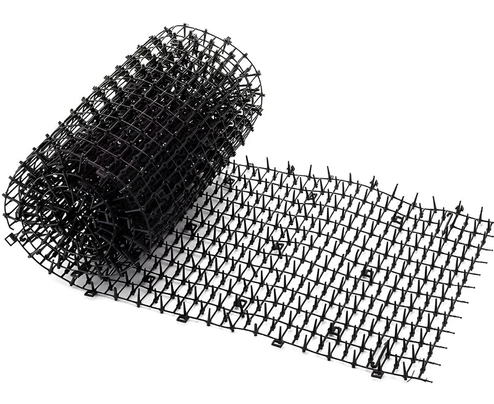 Garden cat scat mat with 1.8cm plastic spikes for pet deterrence on grass