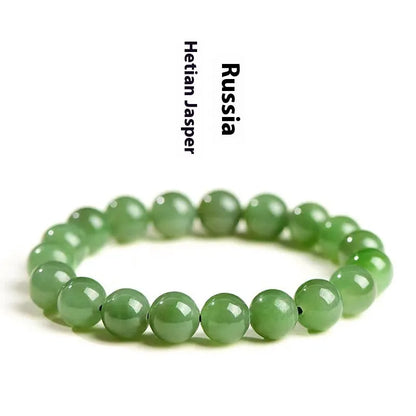 Natural jasper ball bracelet with polished Hetian jade beads in multiple sizes from 4mm to 12mm on wrist
