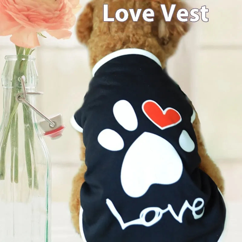 Cotton pet dog top with printed love design and short sleeves, shown in black or white, sizes XS to XXL
