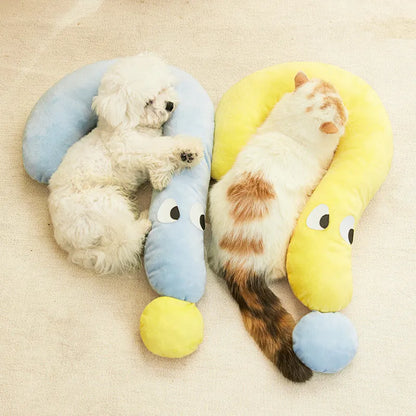 Blue rectangular pet bed cushion pad on a wooden floor.