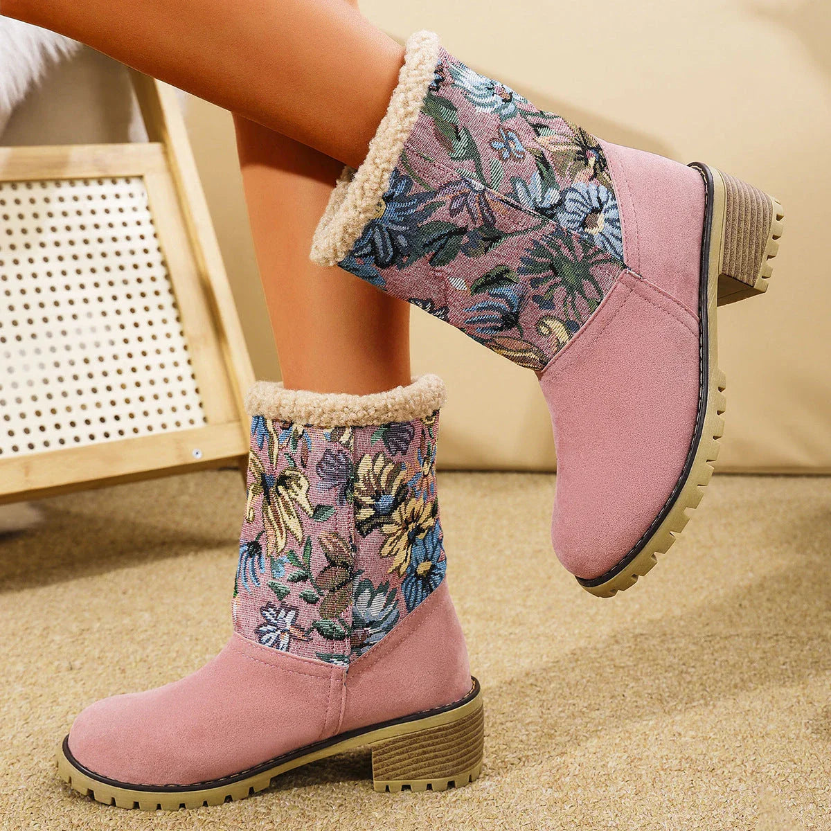 Floral embroidered snow boots in off-white, black, and pink colors with thick square heels and round toe shape