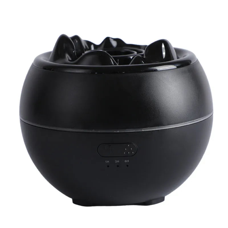 White flame aroma diffuser humidifier with round shape on wooden desk
