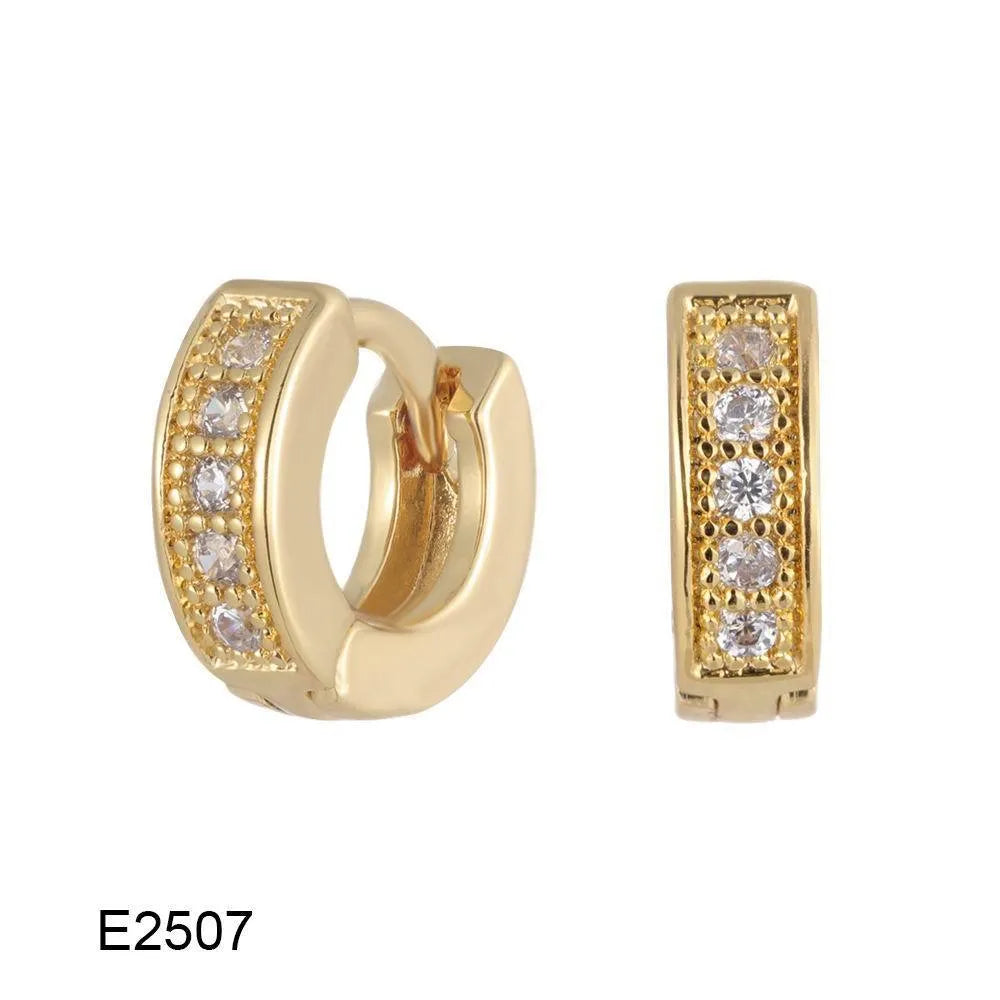 Gold plated heart-shaped clip earrings with a small zircon stone cluster on a copper base.
