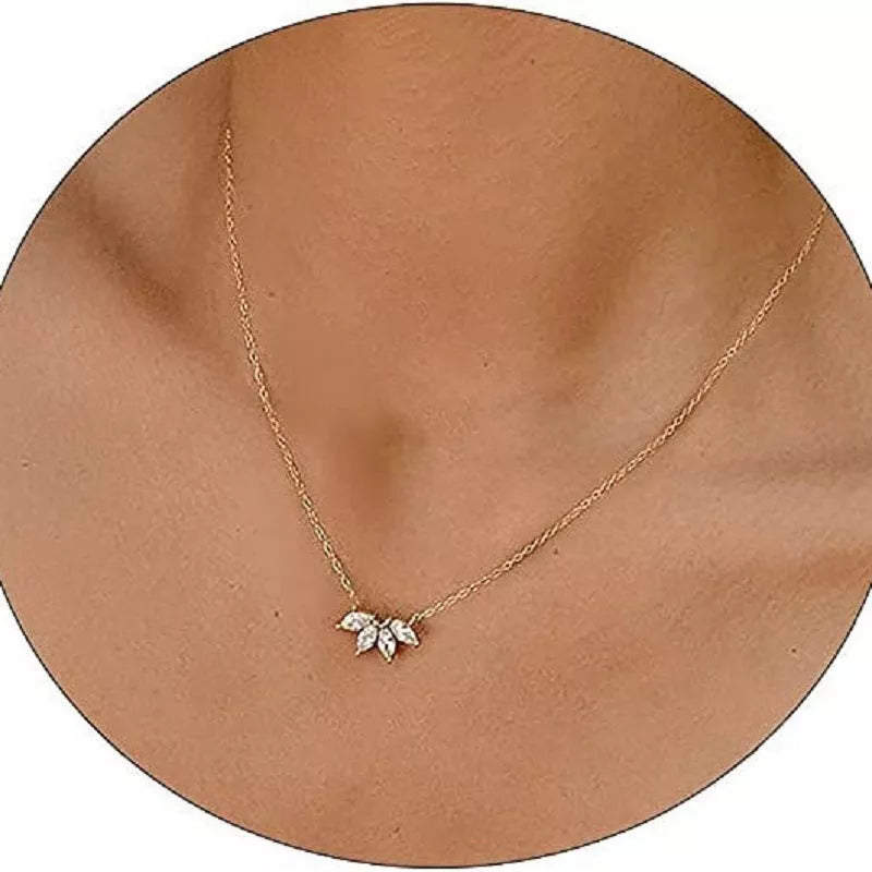 Minimalist lotus flower petal necklace in gold or silver, perfect for women and girls.