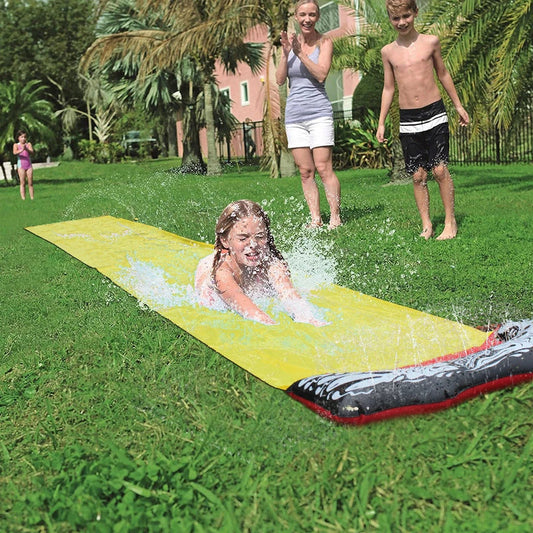 Inflatable water park with spray feature and water slide for children's outdoor play
