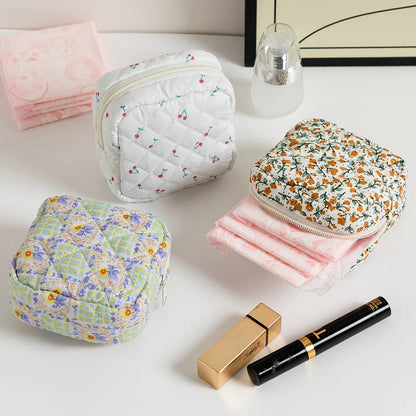 Women's key storage bag with floral patterns including cherry on white background design
