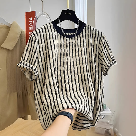 Black and white striped men's loose-fit short sleeve pullover on a hanger