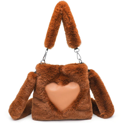 Plush tote bag for women in various colors, including black, brown, white, gray, and pink, with a soft, fluffy exterior and a spacious, versatile design.