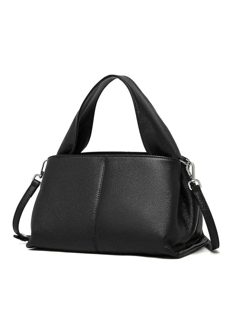 Women's genuine cowhide retro texture messenger bag in horizontal square shape, shown in apricot colour with double shoulder straps.