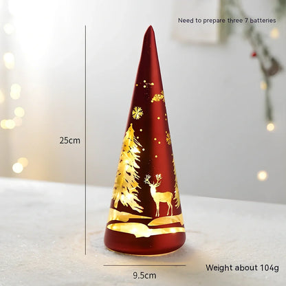 Glass Christmas desktop decoration showing tree, cone, and cup designs in various colours