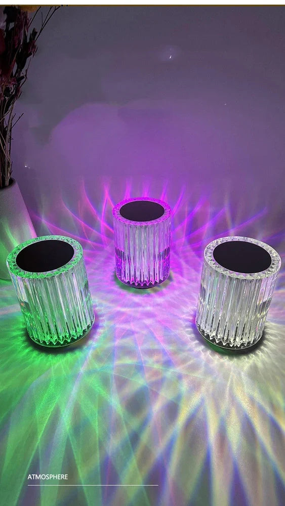 Crystal lamp with acrylic lines showing RGB lighting options on 9cm by 13cm base