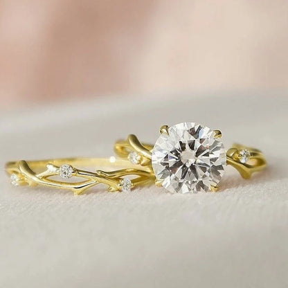 Geometric design rose gold plated couple rings with simulation diamond centrepiece showing faceted edges