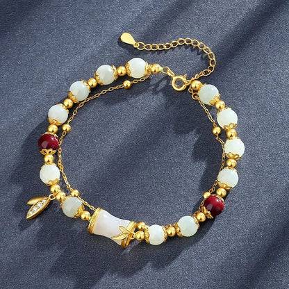 Retro bracelet with Ruyi flower design in glass and coloured glaze beads with electroplated accents