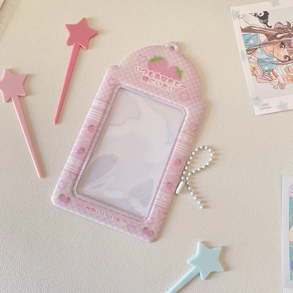 Cartoon plaid strawberry PVC card holder measuring 7.6 by 13.6 centimetres with lanyard attachment