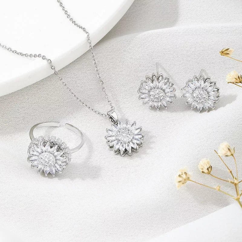 Sunflower stainless steel jewelry set with zircon accents, including necklace, ring, and earrings