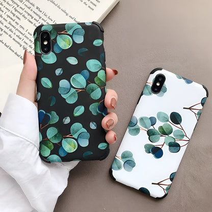 Black silicone iPhone case with a leaf pattern design on the back.