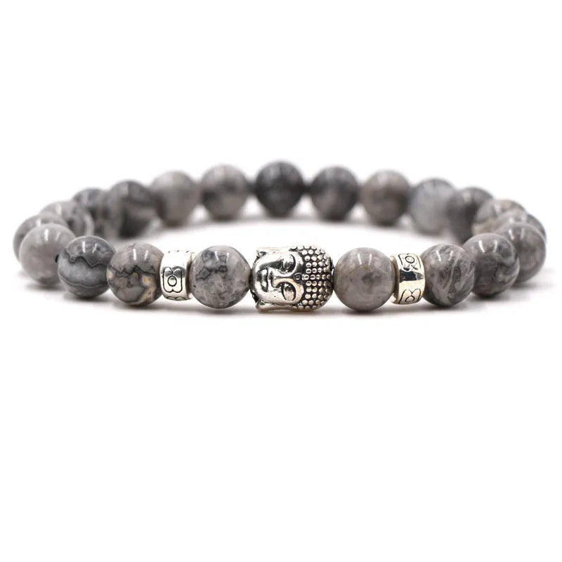 Natural stone stretch bracelet with round beads in various colours including Tigereye and turquoise.