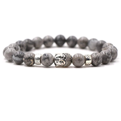 Natural stone stretch bracelet with round beads in various colours including Tigereye and turquoise.