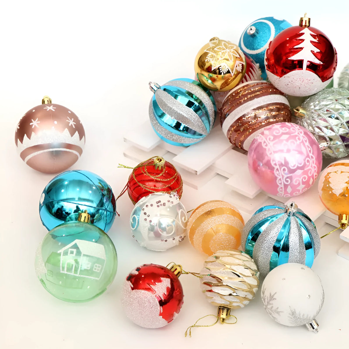 Hand-painted 6cm Christmas tree baubles in red, gold, silver and blue colours