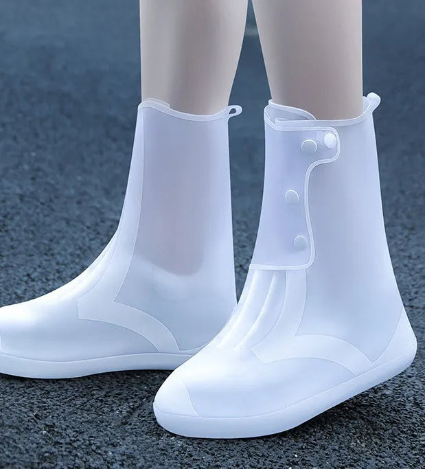 White high top PVC waterproof shoe cover for women with anti-skid sole.