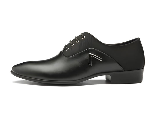 Men's black Oxford shoes with a polished PU upper and durable rubber sole on a wooden floor.
