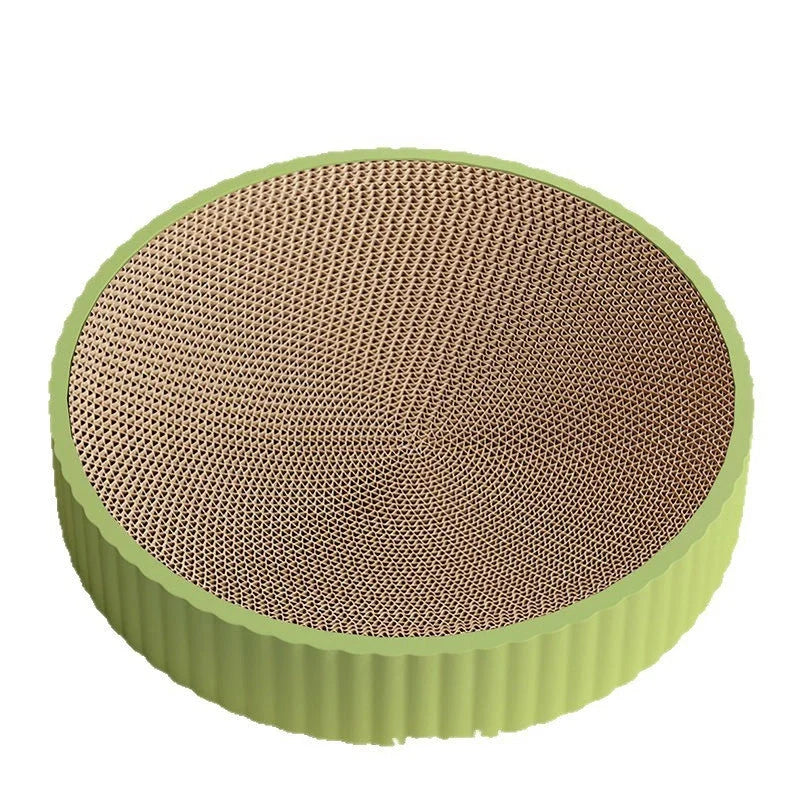 Green round cat scratching board measuring 55cm with corrugated paper surface and two replacement inserts