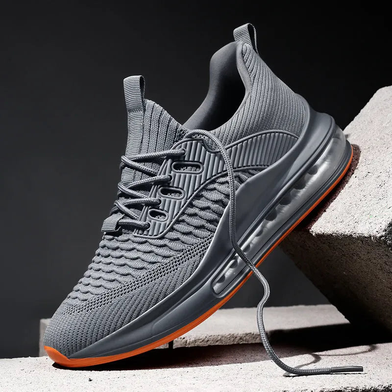Men's black low-top mesh running shoes with lace-up front and platform sole.