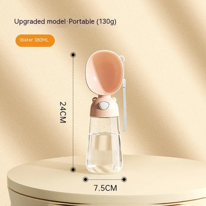 Portable dog water bottle with feeder bowl in brown, pink, or yellow colours for outdoor pet travel