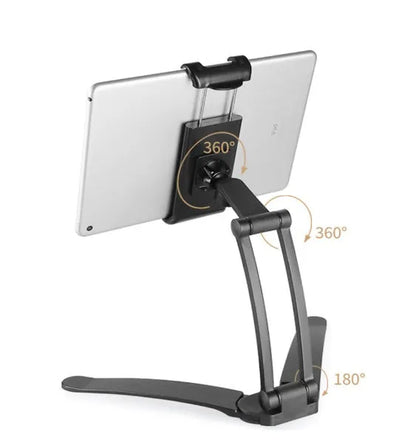 Aluminium alloy desktop tablet stand with adjustable clips on a 23.5cm base, holding a tablet at an angle