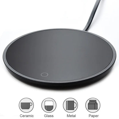 Black coffee mug warmer pad with temperature switch on desk